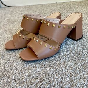 Gold pyramid studded, slip on sandal. Barely used, doesn’t fit me right. No box